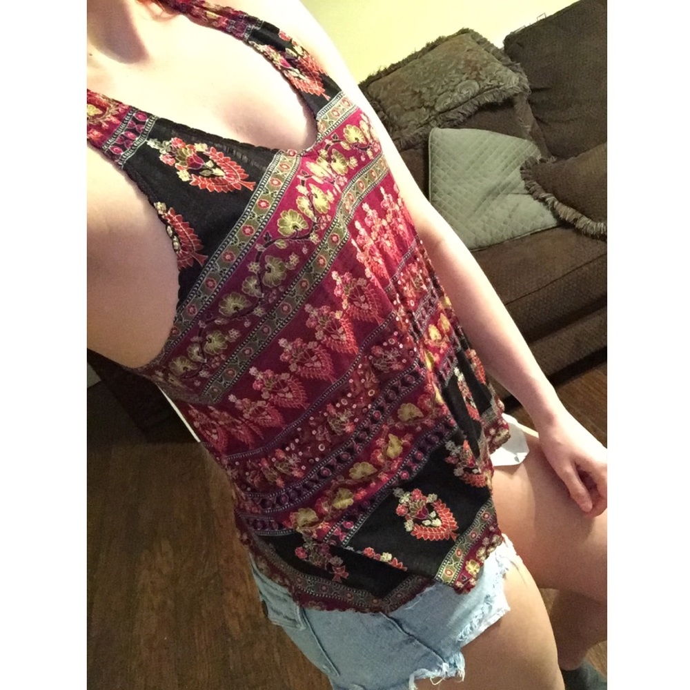 Large. Forever 21. Can fit s, m, l. Never worn